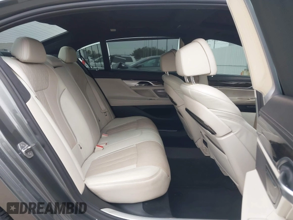 2016 BMW 7 Series 740i with VIN WBA7E2C56GG546920, listed as a IAAI auction lot 41610698 with 119,689 mi miles. Bid and sale history available at carsss.com. Image 8.
