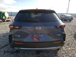 2023 Mazda CX-50 Premium Plus z VIN 7MMVABEY3PN106534, wystawiony jako Copart lot #68754472 z przebiegiem 4 110 mil mil oraz . Historia ofert i sprzedaży dostępna na DreamBid. Obrazek 6.