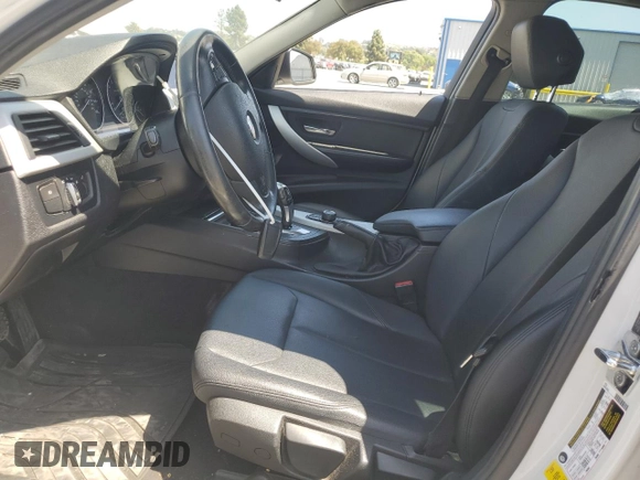 2012 BMW 3 Series 328i with VIN WBA3A5G51CNP16676, listed as a Copart auction lot 58172565 with 146,508 mi miles and Salvage title. Bid and sale history available at DreamBid. Image 7.