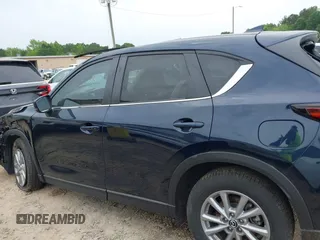 2023 Mazda CX-5 S Carbon Edition z VIN JM3KFBCM6P0251947, wystawiony jako IAAI lot #42286595 z przebiegiem 9 434 mil mil oraz . Historia ofert i sprzedaży dostępna na DreamBid. Obrazek 14.