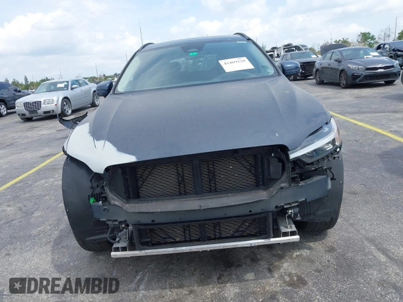 2022 Volvo XC60 Momentum z VIN YV4L12RKXN1052826, wystawiony jako IAAI lot #41869228 z przebiegiem 30 044 mil mil oraz . Historia ofert i sprzedaży dostępna na DreamBid. Obrazek 13.