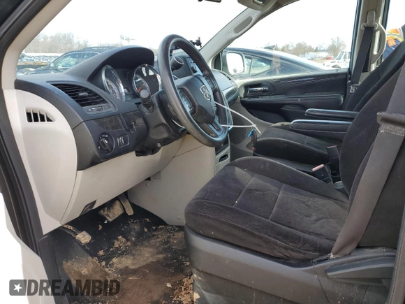 2014 Dodge Grand Caravan SE with VIN 2C4RDGBG0ER136799, listed as a Copart auction lot 45430905 with 148,309 mi miles and Clean Title. Bid and sale history available at DreamBid. Image 7.