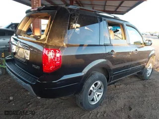 2004 Honda Pilot EX with VIN 2HKYF18624H620101, listed as a IAAI auction lot 41841945 with 196,158 mi miles. Bid and sale history available at carsss.com. Image 4.