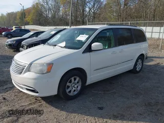 2012 Chrysler Town & Country Touring z VIN 2C4RC1BG6CR213480, wystawiony jako IAAI lot #41887256 z przebiegiem 153 200 mil mil oraz . Historia ofert i sprzedaży dostępna na DreamBid. Obrazek 2.