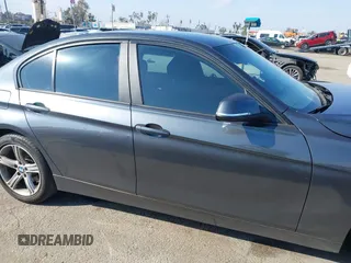 2015 BMW 3 Series 320i with VIN WBA3B1C55FK140317, listed as a IAAI auction lot 41434306 with 120,627 mi miles. Bid and sale history available at carsss.com. Image 13.