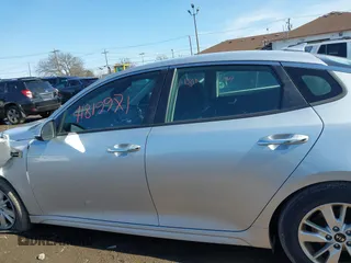 2016 Kia Optima LX with VIN 5XXGT4L34GG078857, listed as a IAAI auction lot 41819971 with 112,963 mi miles. Bid and sale history available at carsss.com. Image 14.