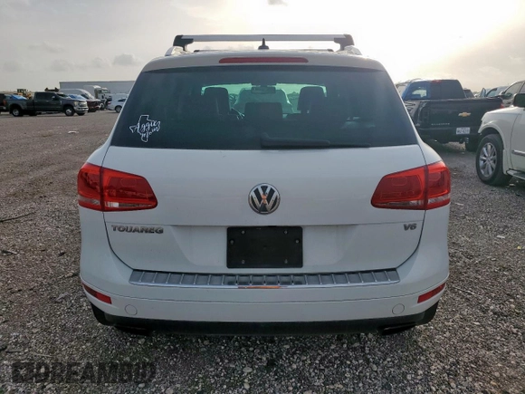 2012 Volkswagen Touareg Sport z VIN WVGEF9BP4CD007058, wystawiony jako Copart lot #56971745 z przebiegiem 181 221 mil mil oraz Czysty tytuł • Clean title. Historia ofert i sprzedaży dostępna na DreamBid. Obrazek 6.