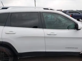 2019 Jeep Cherokee Latitude Plus with VIN 1C4PJLLX9KD203048, listed as a IAAI auction lot 42293811 with 56,221 mi miles and . Bid and sale history available at DreamBid. Image 14.