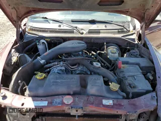 2001 Dodge Dakota z VIN 1B7GG2AZ41S152288, wystawiony jako Copart lot #59952635 z przebiegiem 167 721 mil mil oraz Czysty tytuł • Clean title. Historia ofert i sprzedaży dostępna na DreamBid. Obrazek 11.