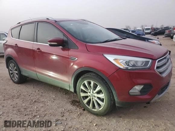 2017 Ford Escape Titanium with VIN 1FMCU0J99HUB42779, listed as a Copart auction lot 47860945 with 98,114 mi miles and Salvage Title. Bid and sale history available at carsss.com. Image 4.