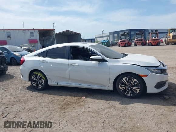 2018 Honda Civic EX-T z VIN 19XFC1F3XJE004123, wystawiony jako IAAI lot #42090933 z przebiegiem 81 228 mil mil oraz . Historia ofert i sprzedaży dostępna na DreamBid. Obrazek 13.