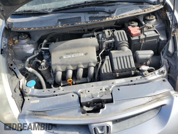 2007 Honda Fit z VIN JHMGD38447S026125, wystawiony jako Copart lot #56554145 z przebiegiem 227 284 mil mil oraz Szkoda całkowita • Salvage title. Historia ofert i sprzedaży dostępna na DreamBid. Obrazek 11.