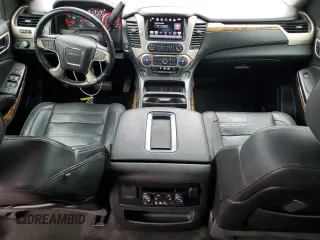 2016 GMC Yukon XL Denali with VIN 1GKS2HKJ1GR199710, listed as a Copart auction lot 49172615 with 261,856 mi miles and Salvage Title. Bid and sale history available at DreamBid. Image 8.