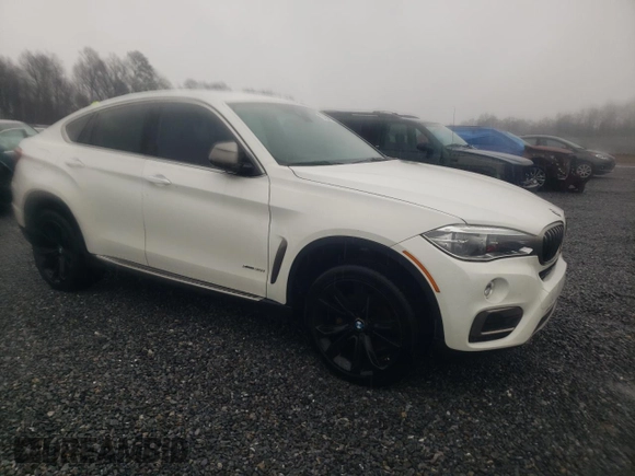 2015 BMW X6 xDrive35i with VIN 5UXKU2C59F0N76404, listed as a Copart auction lot 73426012 with 141,359 mi miles. Bid and sale history available at carsss.com. Image 4.
