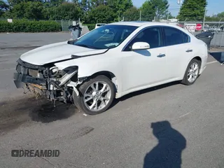2014 Nissan Maxima S with VIN 1N4AA5AP2EC909749, listed as a IAAI auction lot 42456426 with 185,554 mi miles and . Bid and sale history available at DreamBid. Image 2.
