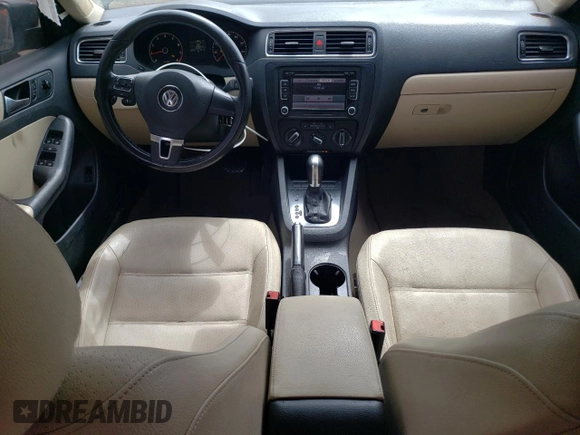 2011 Volkswagen Jetta SE with VIN 3VWDX7AJ6BM395554, listed as a Copart auction lot 57397585 with 139,857 mi miles and Salvage title. Bid and sale history available at DreamBid. Image 8.