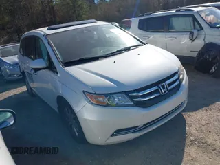 2015 Honda Odyssey EX-L z VIN 5FNRL5H61FB042899, wystawiony jako IAAI lot #41650811 z przebiegiem 162 228 mil mil oraz . Historia ofert i sprzedaży dostępna na DreamBid. Obrazek 1.