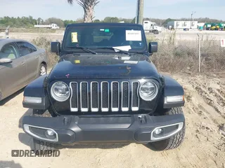 2021 Jeep Wrangler Unlimited Sahara with VIN 1C4HJXEG3MW536507, listed as a IAAI auction lot 41601893 with 51,214 mi miles and . Bid and sale history available at DreamBid. Image 12.