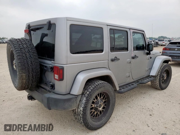 2014 Jeep Wrangler Unlimited Rubicon с VIN 1C4HJWFG3EL322449, выставлен на аукционе Copart как лот 57187665 с пробегом 122 469 миль миль и Списание • Salvage title. История ставок и продаж доступна на DreamBid. Изображение 3.