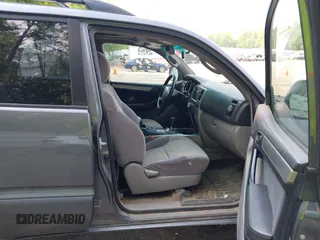 2004 Toyota 4Runner SR5 z VIN JTEBT14R240031458, wystawiony jako IAAI lot #42452058 z przebiegiem 216 294 mil mil oraz . Historia ofert i sprzedaży dostępna na DreamBid. Obrazek 5.