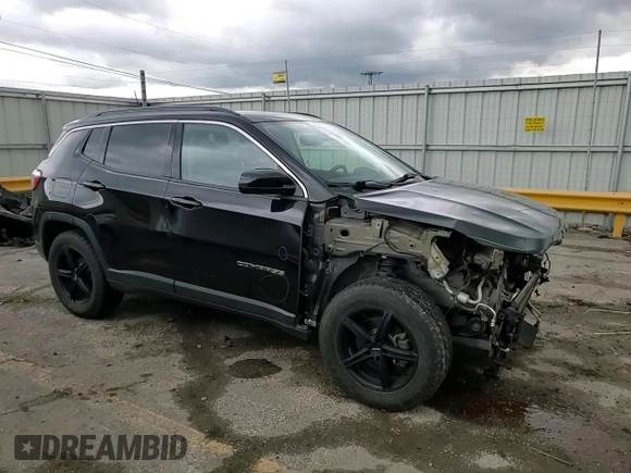2017 Jeep Compass Latitude z VIN 3C4NJDBB1HT650771, wystawiony jako Copart lot #58190405 z przebiegiem 93 470 mil mil oraz Szkoda całkowita • Salvage title. Historia ofert i sprzedaży dostępna na DreamBid. Obrazek 14.
