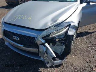 2015 Infiniti Q50 with VIN JN1BV7AR3FM416371, listed as a IAAI auction lot 42036139 with 76,239 mi miles and . Bid and sale history available at DreamBid. Image 6.