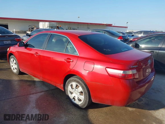 2007 Toyota Camry CE with VIN 4T1BE46K37U106127, listed as a IAAI auction lot 42088929 with 241,810 mi miles. Bid and sale history available at carsss.com. Image 3.