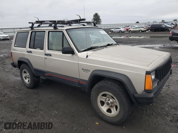 1996 Jeep Cherokee Sport with VIN 1J4FJ68S6TL112962, listed as a Copart auction lot 41540935 with 234,458 mi miles and Salvage Title. Bid and sale history available at carsss.com. Image 4.
