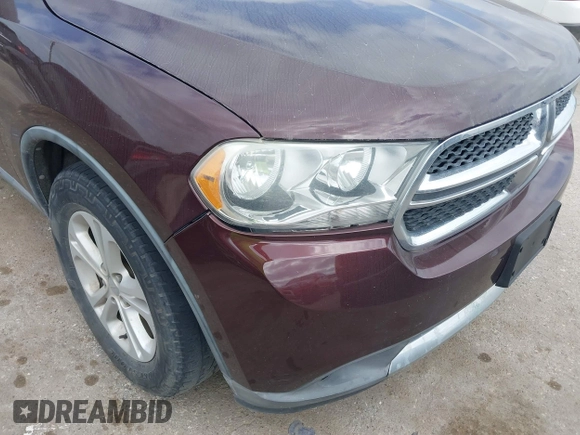 2012 Dodge Durango Crew with VIN 1C4RDHDG7CC144357, listed as a IAAI auction lot 42019204 with 174,408 mi miles and . Bid and sale history available at DreamBid. Image 6.