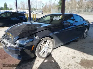 2014 BMW 6 Series 640i xDrive with VIN WBA6B8C5XED452416, listed as a IAAI auction lot 41851885 with 111,445 mi miles. Bid and sale history available at carsss.com. Image 2.