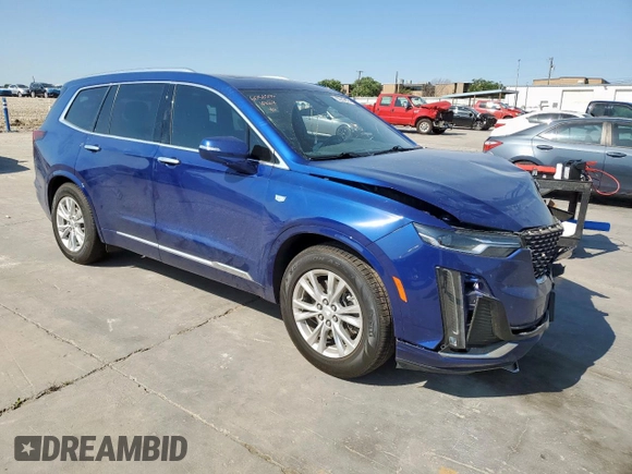 2023 Cadillac XT6 FWD Luxury z VIN 1GYKPAR42PZ167668, wystawiony jako Copart lot #53278075 z przebiegiem 32 212 mil mil oraz Szkoda całkowita • Salvage title. Historia ofert i sprzedaży dostępna na DreamBid. Obrazek 4.