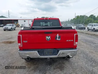 2015 Ram 1500 Laramie z VIN 1C6RR7JM8FS501701, wystawiony jako IAAI lot #42224424 z przebiegiem 59 591 mil mil oraz . Historia ofert i sprzedaży dostępna na DreamBid. Obrazek 16.