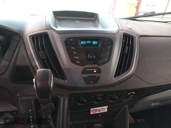 2016 Ford Transit Cargo z VIN 1FTYE1YM4GKA89538, wystawiony jako IAAI lot #42679120 z przebiegiem 223 958 mil mil oraz . Historia ofert i sprzedaży dostępna na DreamBid. Obrazek 13.