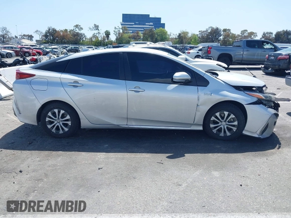 2021 Toyota Prius LE with VIN JTDKAMFP1M3180370, listed as a IAAI auction lot 41928512 with 83,249 mi miles and . Bid and sale history available at DreamBid. Image 14.