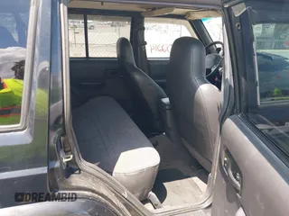 1999 Jeep Cherokee Sport with VIN 1J4FF68S0XL509171, listed as a IAAI auction lot 42402214 with Not provided miles and . Bid and sale history available at DreamBid. Image 8.