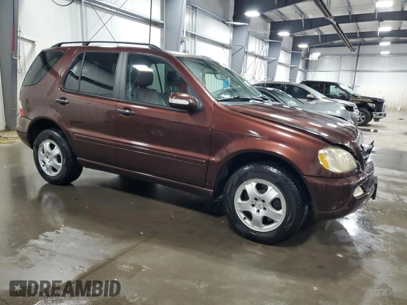2002 Mercedes-Benz M-Class with VIN 4JGAB75E72A323840, listed as a Copart auction lot 75729384 with 122,811 mi miles and Salvage Title. Bid and sale history available at carsss.com. Image 4.