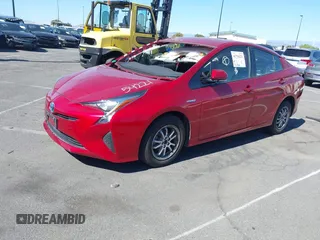 2016 Toyota Prius Four with VIN JTDKARFUXG3523023, listed as a IAAI auction lot 41754221 with 74,988 mi miles. Bid and sale history available at carsss.com. Image 2.