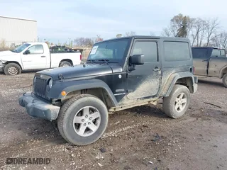 2014 Jeep Wrangler Sport with VIN 1C4AJWAG1EL311295, listed as a IAAI auction lot 40962665 with 143,596 mi miles. Bid and sale history available at carsss.com. Image 17.