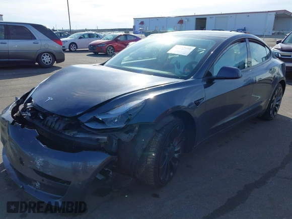 2021 Tesla Model 3 Performance with VIN 5YJ3E1EC3MF082532, listed as a IAAI auction lot 41757905 with 60,431 mi miles and . Bid and sale history available at DreamBid. Image 2.
