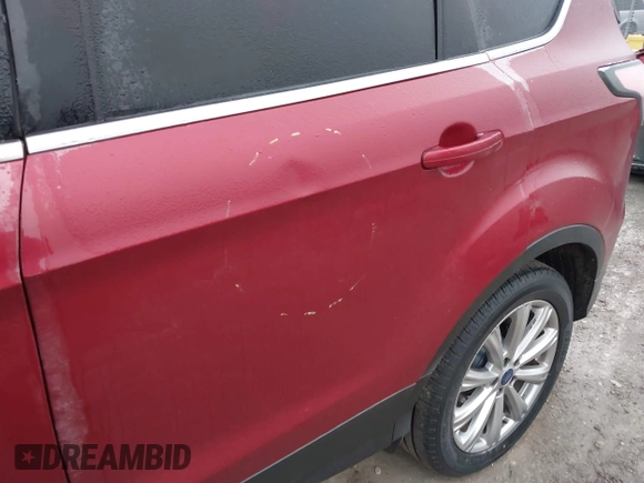 2017 Ford Escape Titanium with VIN 1FMCU9J95HUA48807, listed as a IAAI auction lot 41522636 with 218,342 mi miles. Bid and sale history available at carsss.com. Image 20.