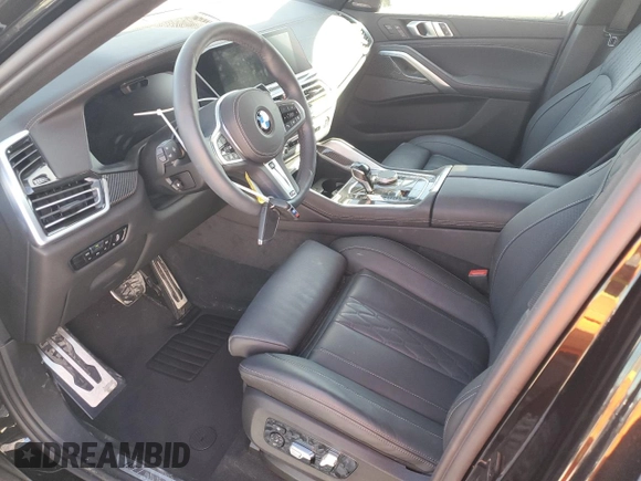 2023 BMW X6 M50i with VIN 5UXCY8C05P9N77000, listed as a Copart auction lot 50704703 with 5,062 mi miles. Bid and sale history available at carsss.com. Image 7.