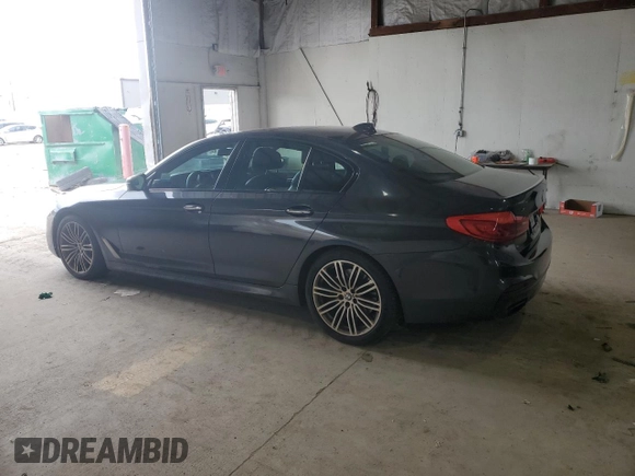 2018 BMW 5 Series M550i xDrive with VIN WBAJB9C58JB035267, listed as a Copart auction lot 64616605 with 125,365 mi miles and Clean title. Bid and sale history available at DreamBid. Image 2.