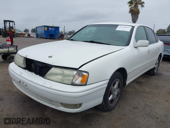 1998 Toyota Avalon XL with VIN 4T1BF18B7WU286333, listed as a IAAI auction lot 41736612 with 227,948 mi miles and . Bid and sale history available at DreamBid. Image 2.