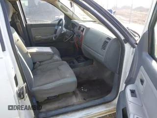 2005 Dodge Dakota SLT with VIN 1D7HE42KX5S251037, listed as a IAAI auction lot 41334761 with 202,865 mi miles and . Bid and sale history available at carsss.com. Image 5.