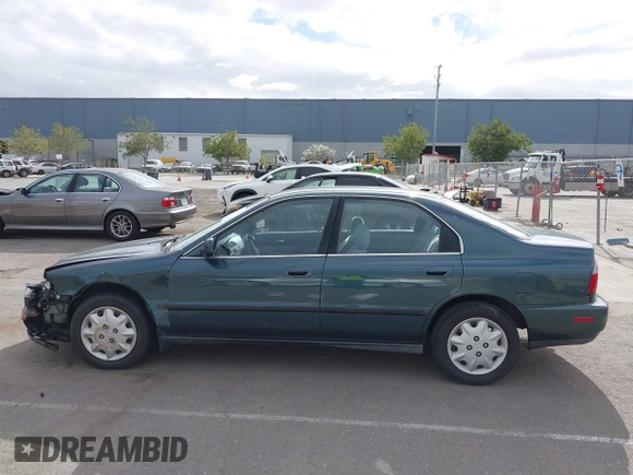 1996 Honda Accord LX with VIN 1HGCD5630TA197512, listed as a IAAI auction lot 41906009 with 79,805 mi miles and . Bid and sale history available at carsss.com. Image 14.