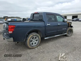 2015 Nissan Titan SV with VIN 1N6AA0EC9FN500624, listed as a Copart auction lot 50982985 with 128,976 mi miles and Salvage title. Bid and sale history available at DreamBid. Image 3.