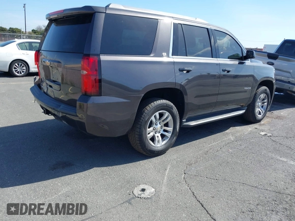 2016 Chevrolet Tahoe LS with VIN 1GNSCAKC2GR110249, listed as a IAAI auction lot 41583619 with 65,542 mi miles and . Bid and sale history available at DreamBid. Image 4.