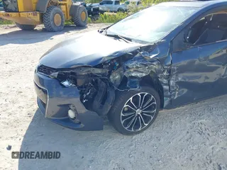 2014 Toyota Corolla L with VIN 2T1BURHE8EC130221, listed as a IAAI auction lot 42005669 with 135,725 mi miles and . Bid and sale history available at DreamBid. Image 6.