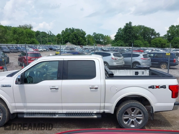 2018 Ford F-150 XL with VIN 1FTEW1EG7JKE76476, listed as a IAAI auction lot 42575219 with 183,308 mi miles and . Bid and sale history available at DreamBid. Image 14.