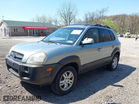 2006 Hyundai Tucson GLS with VIN KM8JN12D06U285856, listed as a IAAI auction lot 42112640 with 157,016 mi miles. Bid and sale history available at carsss.com. Image 2.